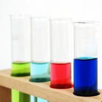 test tubes containing different colored liquids