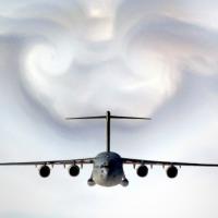 Airplane in sky amid turbulence