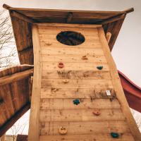 Climbing tower on a playground, photo by Basil Lade