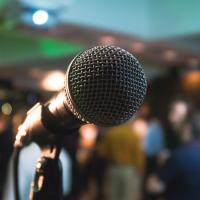 Microphone on stage at a software conference