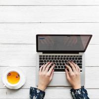 Woman working remotely at a computer