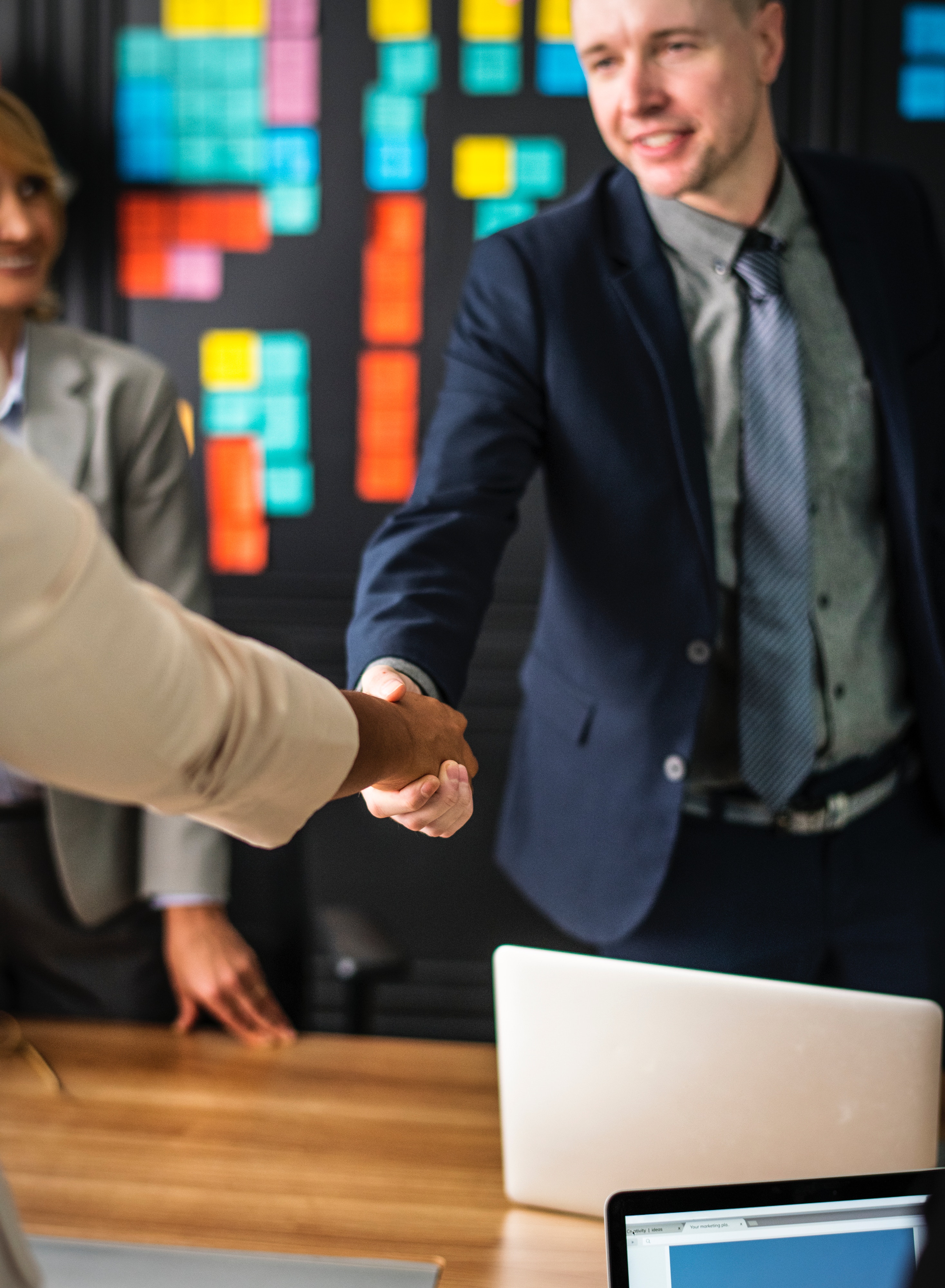 Man shaking client's hand