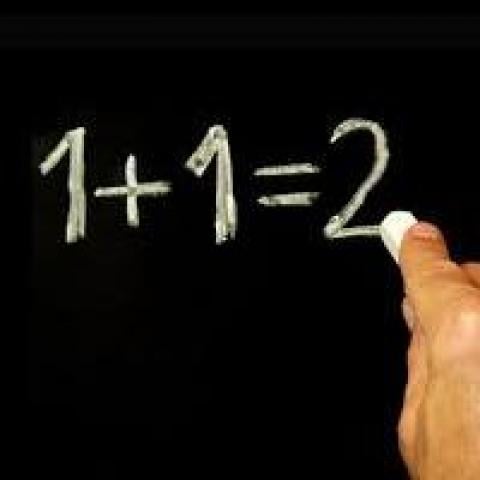 Chalkboard with 1+1=2