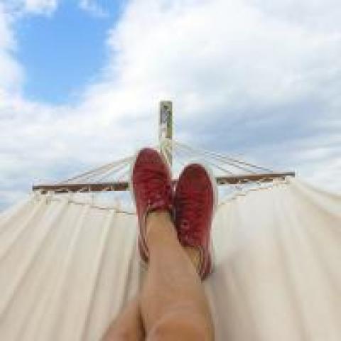 Person with his feet up in a hammock