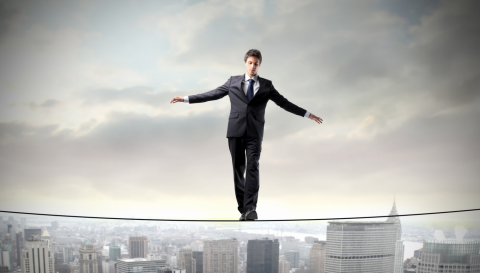 man on tightrope