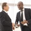 Businessmen engaging in small talk