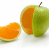 Apple cut open to reveal an orange inside