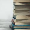 Pile of books on a table, photo by Sharon McCutcheon