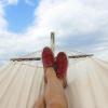 Person with his feet up in a hammock