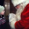 Santa Claus talking to a child