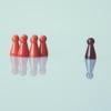 Game pieces with a leader facing the other pieces