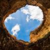 Looking upward at the sky from a silo in the ground